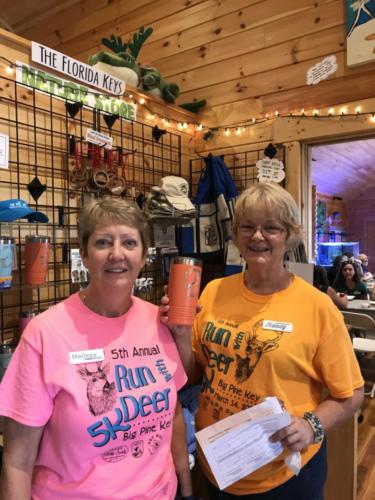 Nature Store Manager Nancy & volunteer - Spring 2020